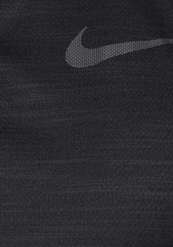 NIKE Regular Fit Funktionsshirt 'Superset' in Schwarz