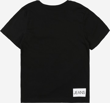 Calvin Klein Jeans T-shirt 'INSTITUTIONAL' i svart: baksida