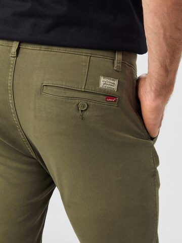 Slimfit Pantaloni eleganți 'XX Chino Slim Tapered' de la LEVI'S ® pe verde