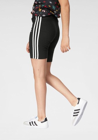 Skinny Pantalon ADIDAS ORIGINALS en noir