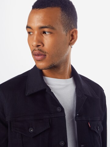 LEVI'S ® Übergangsjacke 'The Trucker Jacket' in Schwarz