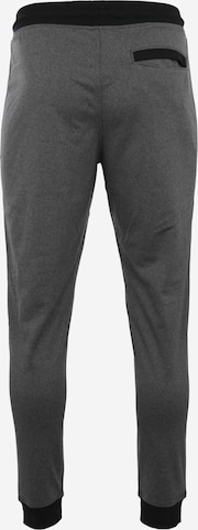UNDER ARMOUR Tapered Workout Pants in Grey: back