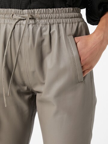 OAKWOOD Slim fit Trousers 'Gift' in Beige
