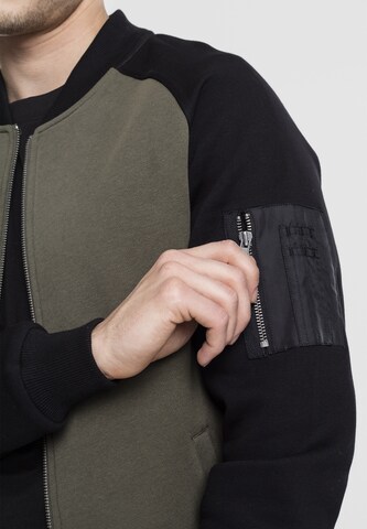 Veste de survêtement 'Bomber' Urban Classics en vert