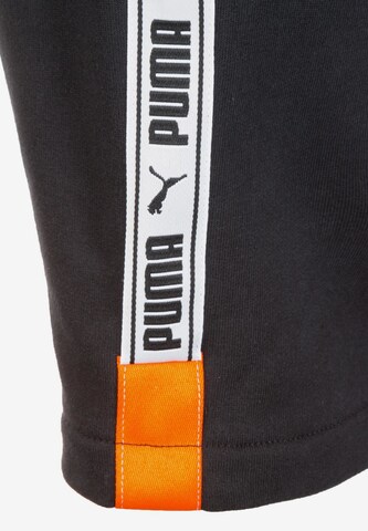 PUMA Regular Shorts 'XTG' in Schwarz