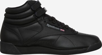 Baskets hautes Reebok en noir : sur le côté