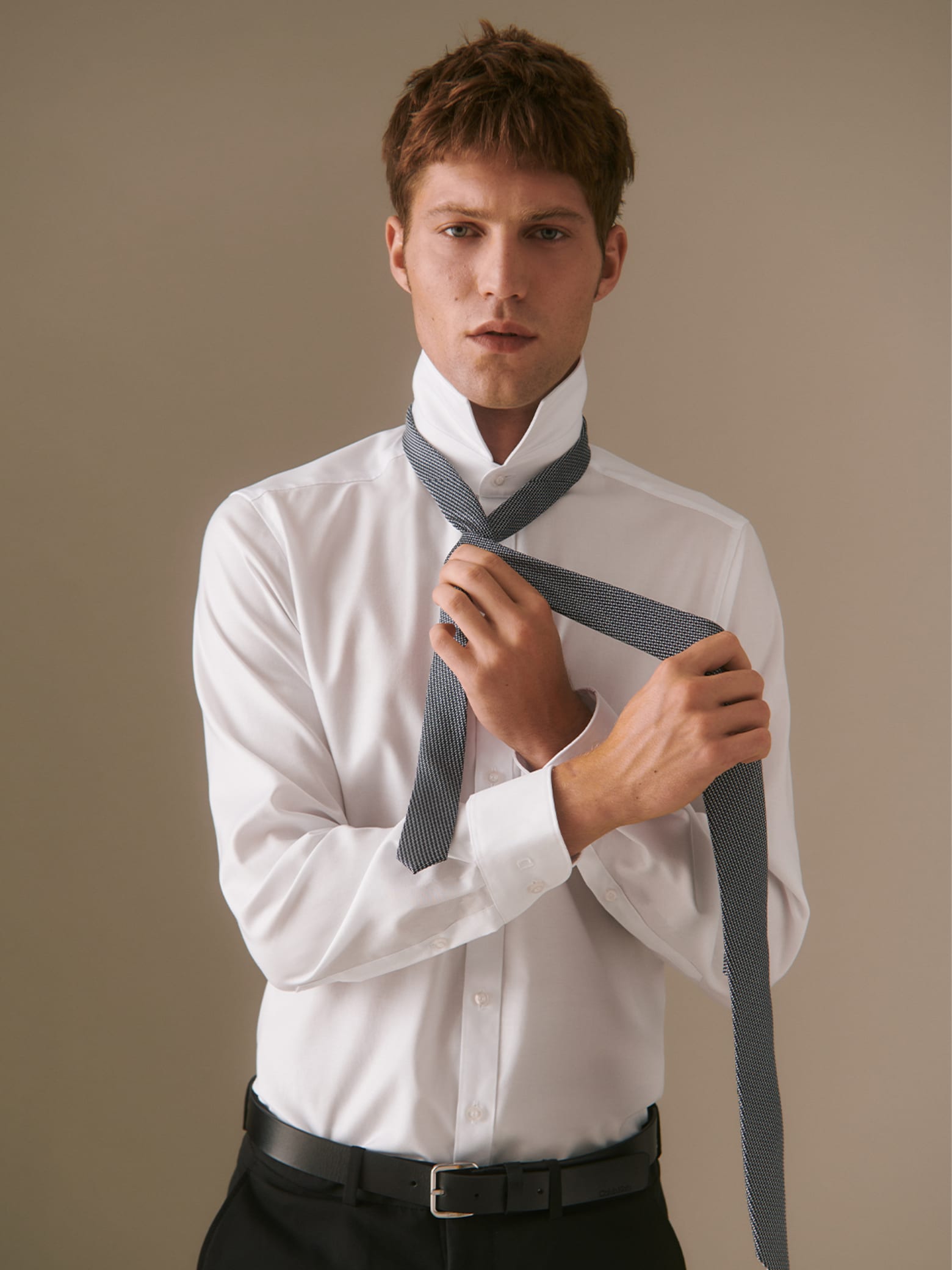 Vaihe vaiheelta Miten solmio sidotaan