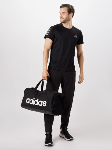 Maglia funzionale 'Own the Run' di ADIDAS SPORTSWEAR in nero