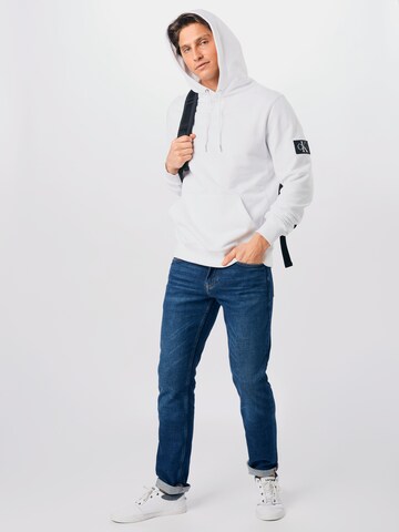 Calvin Klein Jeans Regularny krój Bluzka sportowa w kolorze biały
