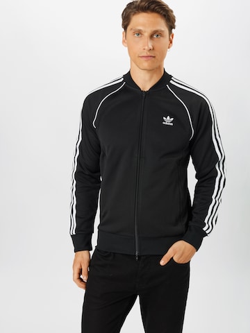 ADIDAS ORIGINALS Regular Fit Collegetakki 'Adicolor Classics Primeblue' värissä musta: edessä