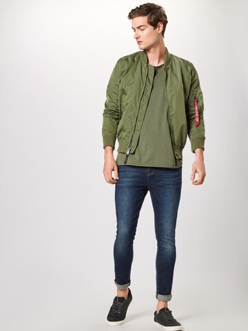 Skinny Jeans 'Travis' de la Superdry pe albastru