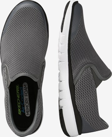 SKECHERS Trampki slip on w kolorze szary: bok