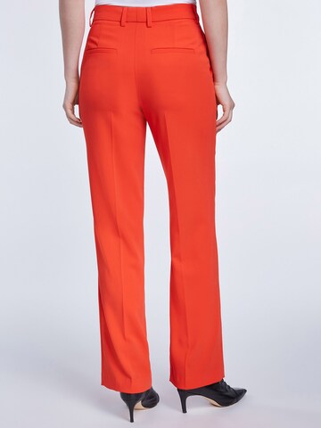 SET Loosefit Hose in Orange