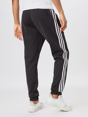 ADIDAS ORIGINALS Tapered Trousers in Black