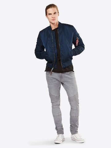 ALPHA INDUSTRIES Välikausitakki värissä sininen