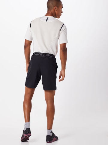 NIKE Normální Sportovní kalhoty – černá: zadní strana