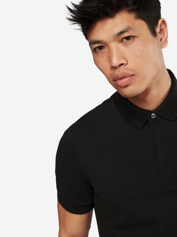 LACOSTE Poloshirt in Schwarz