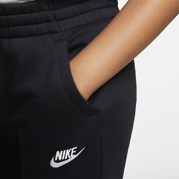 Nike Sportswear Normalny krój Strój do biegania w kolorze czarny