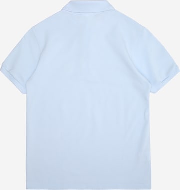 Tricou de la LACOSTE pe albastru: spate