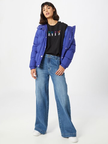 LEVI'S ® Paita 'Graphic Varsity Tee' värissä musta