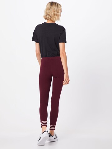 ADIDAS ORIGINALS Skinny Leggings - piros: hátul