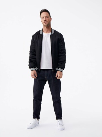 DAN FOX APPAREL Between-Season Jacket 'Jan' in Black