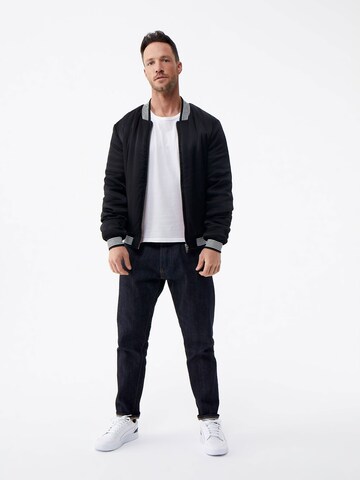 DAN FOX APPAREL Jacke 'Jan' in Schwarz