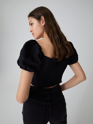 EDITED - Blusa 'Tiam' en negro