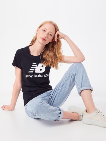 new balance T-Shirt 'Essentials Stacked Logo' in Schwarz