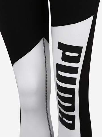 Skinny Pantaloni sport de la PUMA pe negru