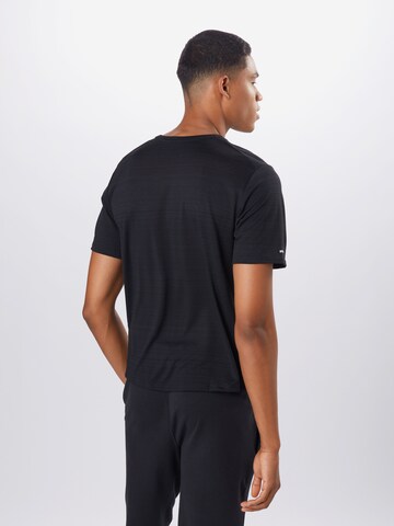 NIKE Functioneel shirt 'Miler' in Zwart