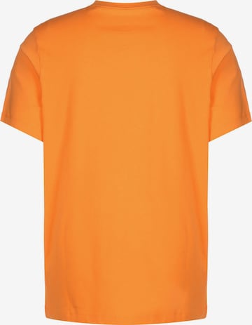 Nike Sportswear Regularny krój Koszulka 'Futura' w kolorze pomarańczowy
