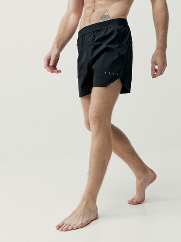 Born Living Yoga Regular Trousers 'Malaui' in Black: front