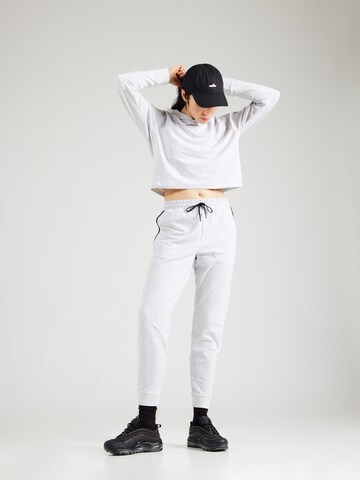 Tapered Pantaloni 'Studio' di On in grigio