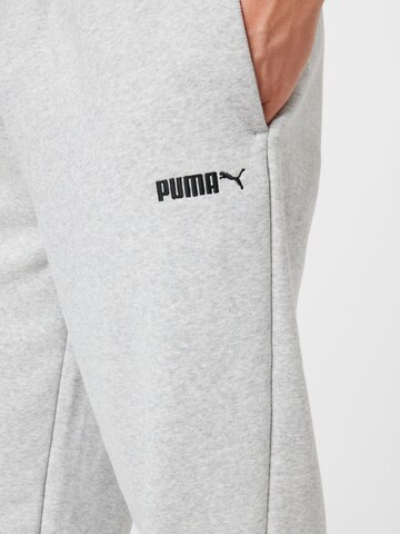 PUMA Zúžený Kalhoty – šedá