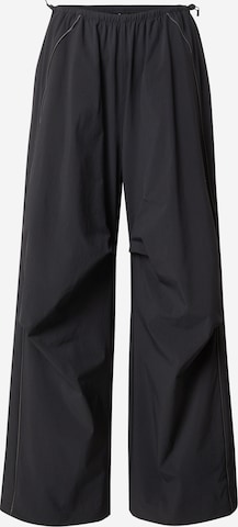 ADIDAS TERREX Wide Leg Housut 'National Geographic AEROREADY Woven' värissä musta: etupuoli