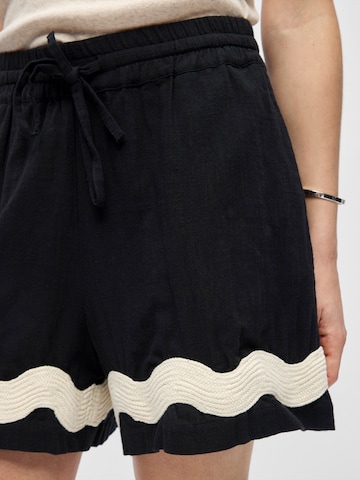 OBJECT Voľný strih Nohavice 'OBJMARICA' - Čierna