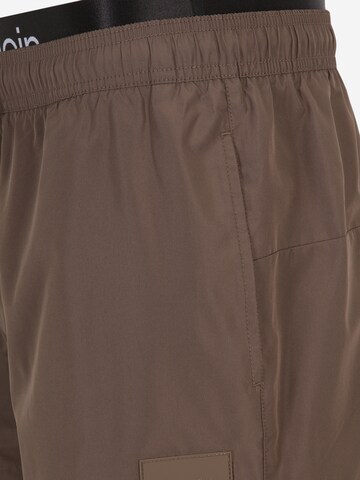 Calvin Klein Swimwear Board Shorts in Brown