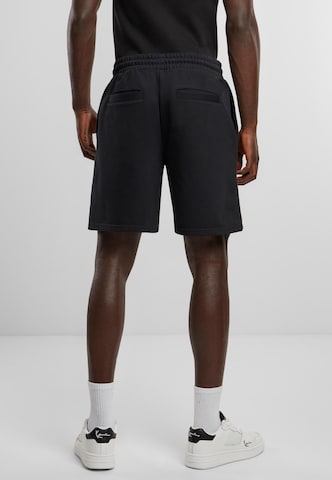 Karl Kani Regular Pants in Black