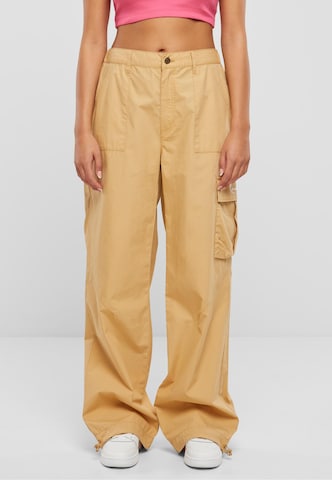 Karl Kani Loosefit Cargobroek in Beige: voorkant