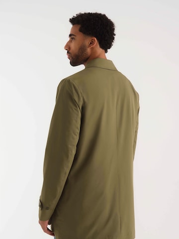 ABOUT YOU x Kevin Trapp Between-Seasons Coat 'Rafael' in Green