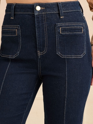 love & roses Tapered Jeans in Blauw