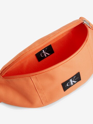 Calvin Klein Jeans - Bolsa de cintura em laranja