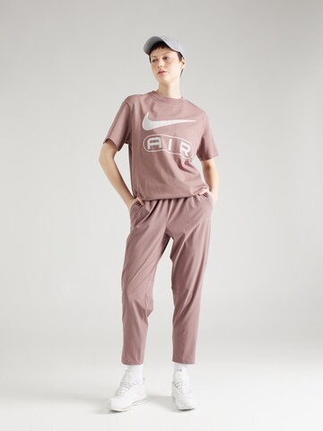 NIKE - Tapered Pantalón deportivo 'FAST' en lila