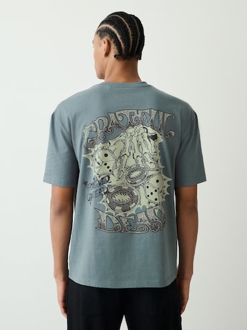 T-Shirt Next en vert : devant