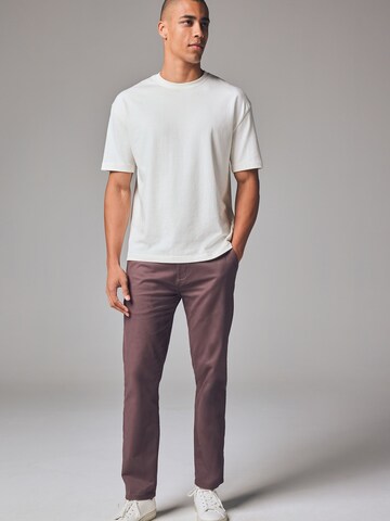 Next Slimfit Chinohousut värissä lila