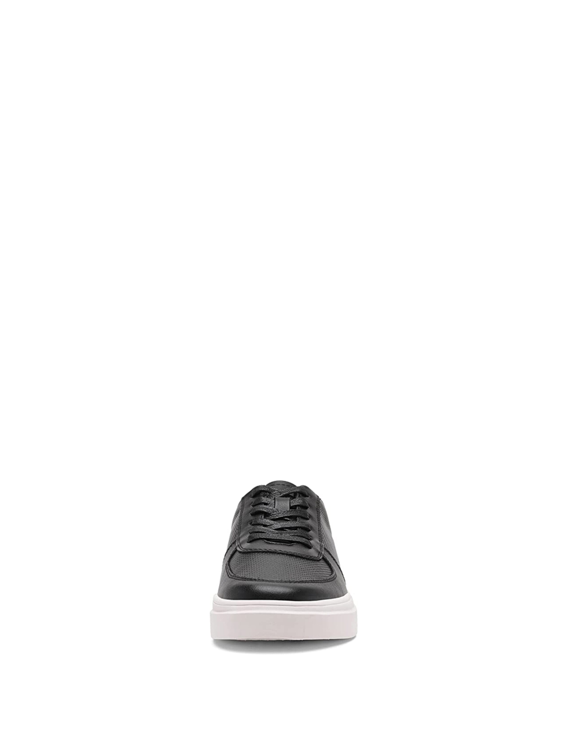 Scarpa slip-on di Bruno Marc in nero