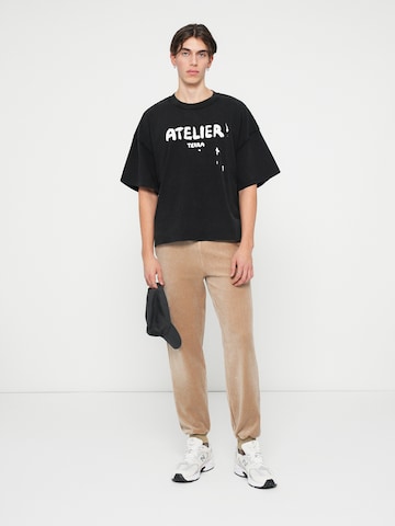 Atelier de roupa T-Shirt in Schwarz