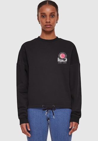 Merchcode Sweatshirt 'Sunset Charm' in Black: front