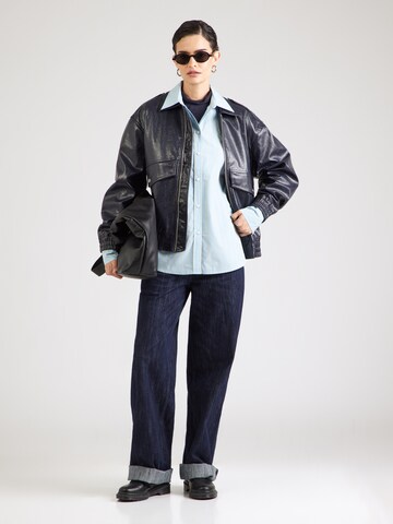 Calvin Klein Jeans Блуза в синьо